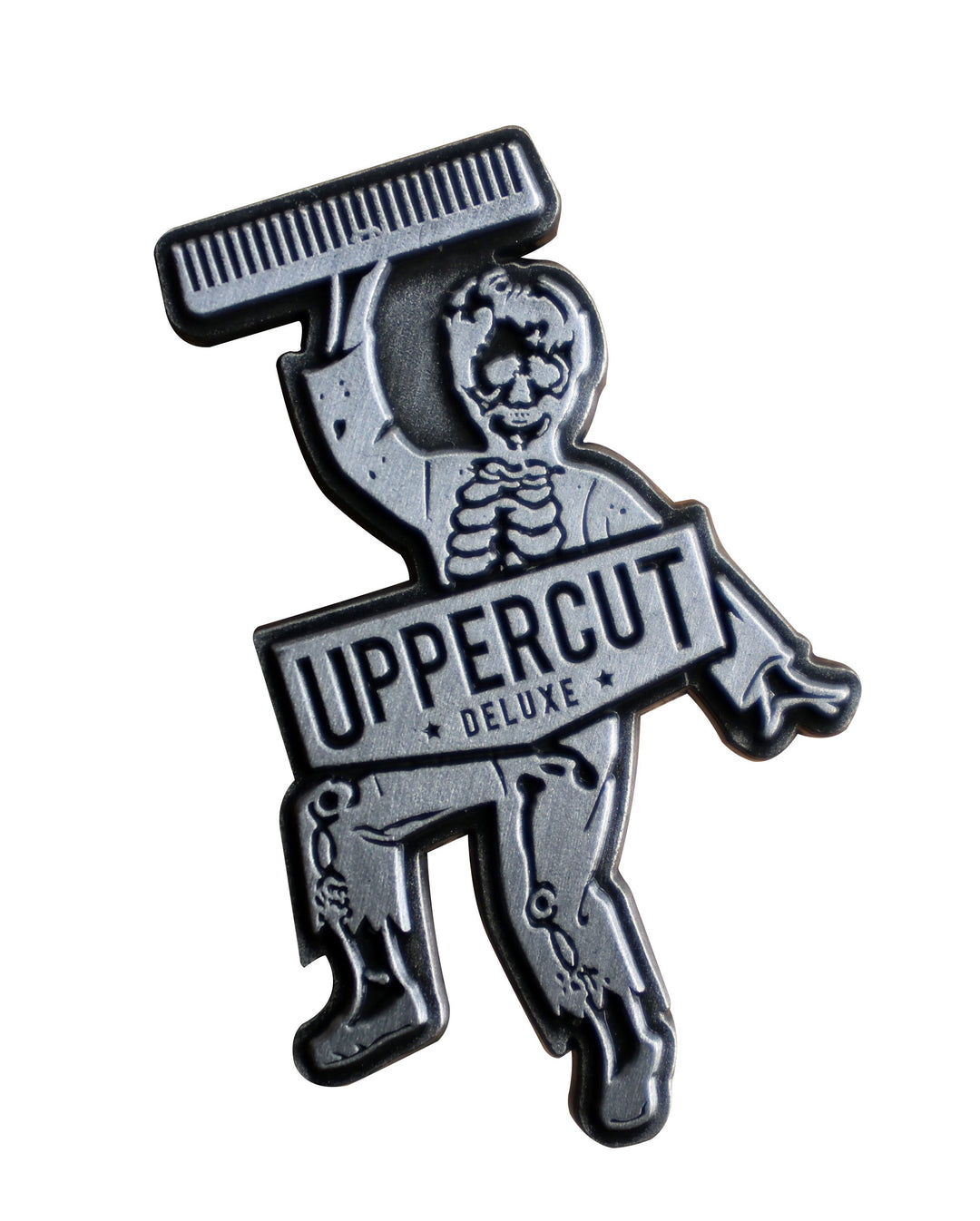 Uppercut Deluxe Skull Dust bonus lapel pin included with each retail tin